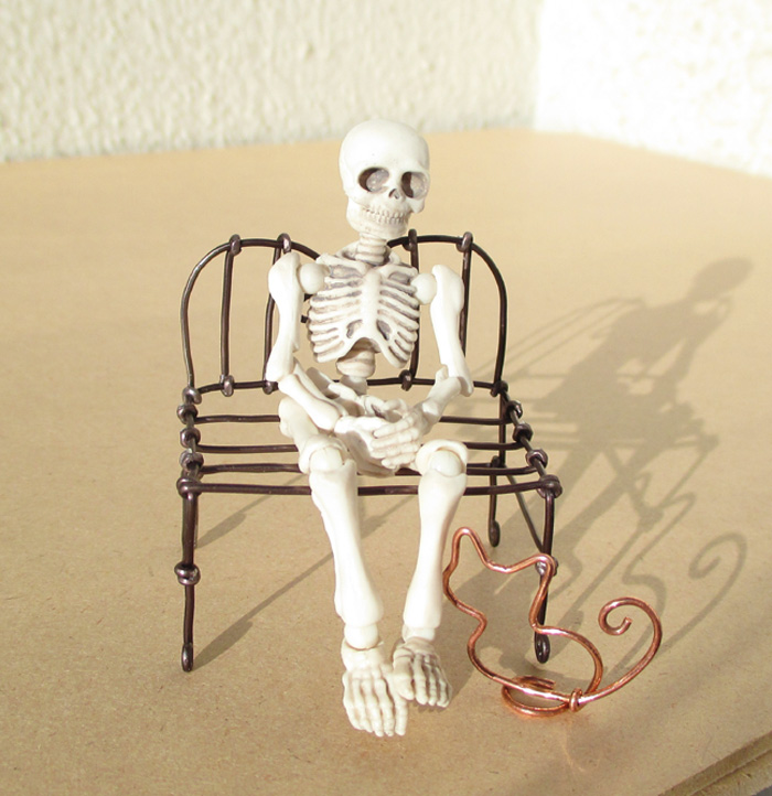 wire_chair_with_skeleton.jpg